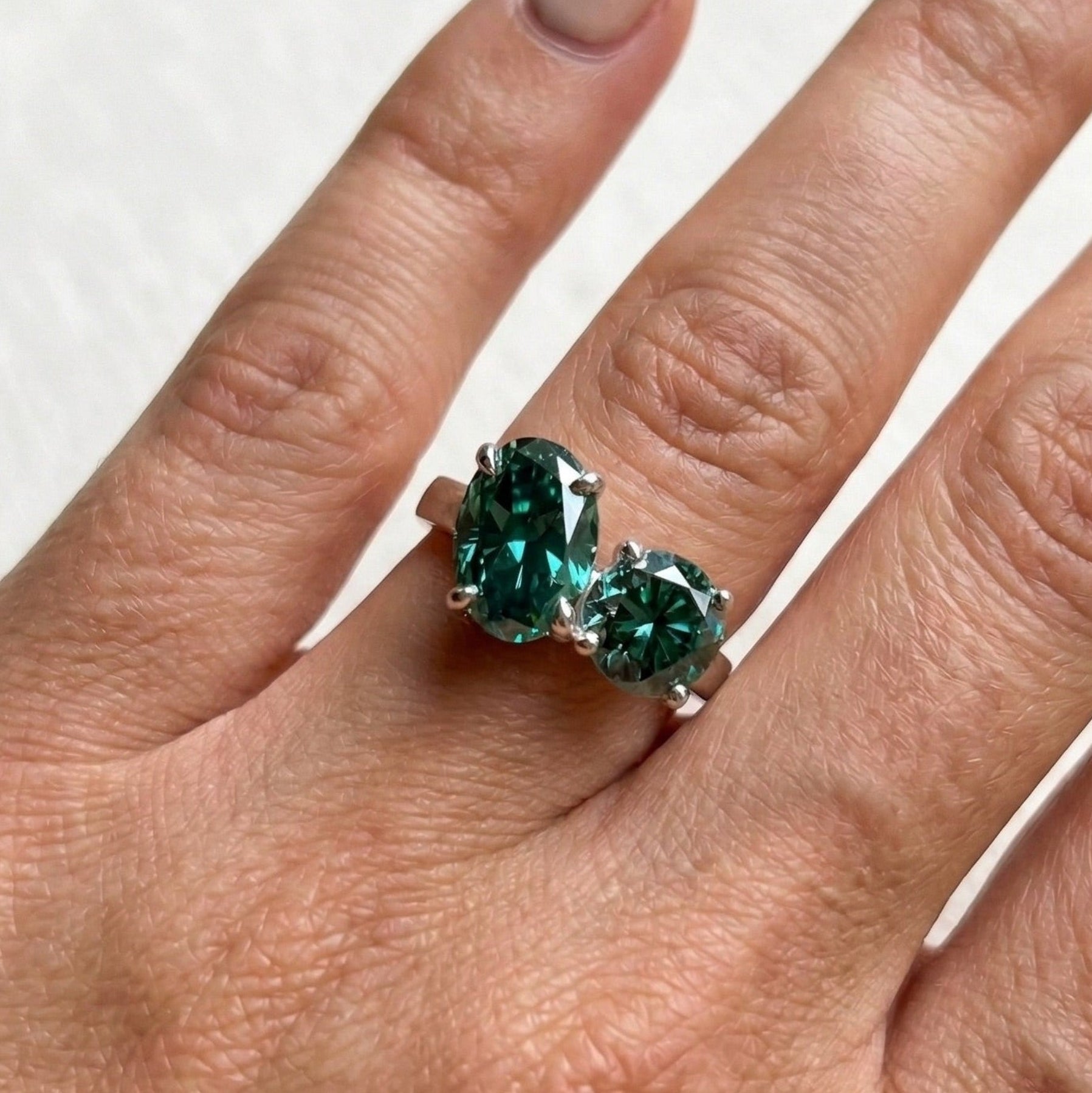 Dark green oval moissanite toi et moi engagement ring in 14K gold