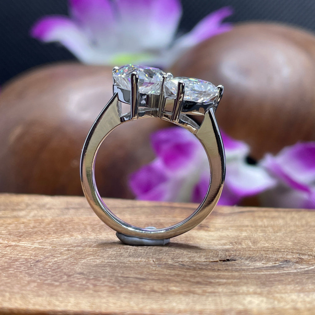 Toi et moi moissanite engagement ring with heart and pear cut stones in 14K white gold
