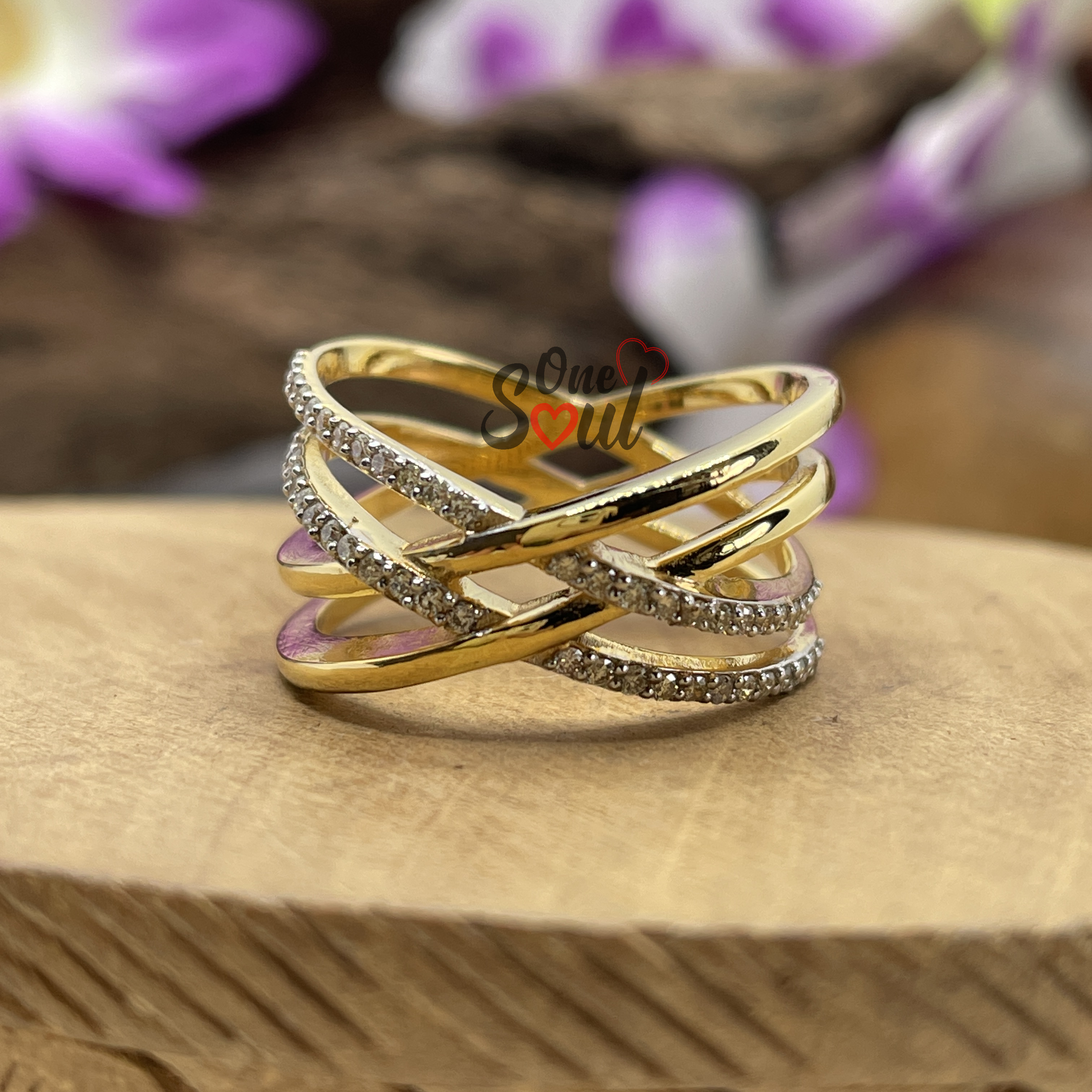 14K yellow gold criss cross moissanite ring with brilliant round cut stone — interlocking wedding band for women