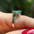 Dark green oval moissanite toi et moi engagement ring in 14K gold