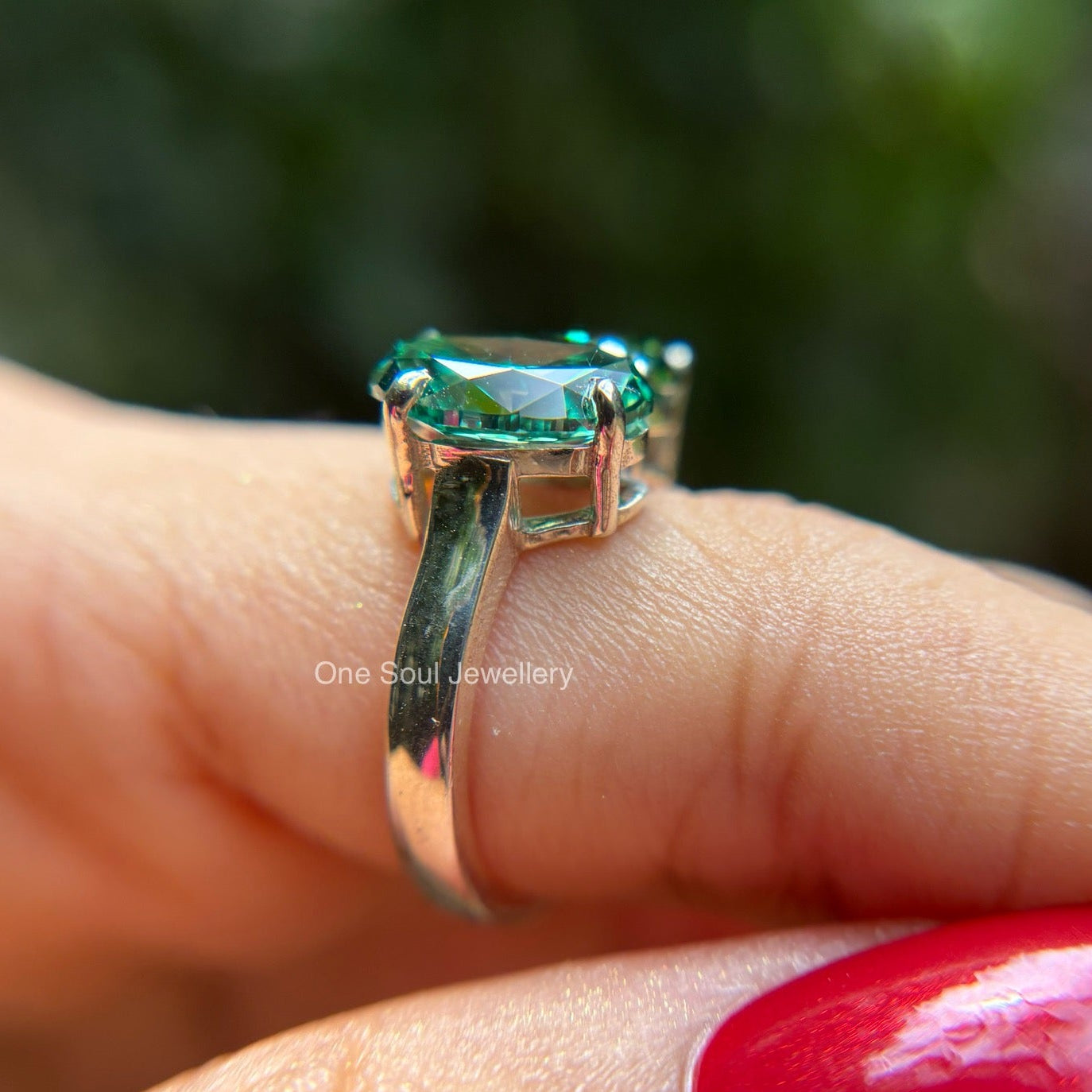 Dark green oval moissanite toi et moi engagement ring in 14K gold