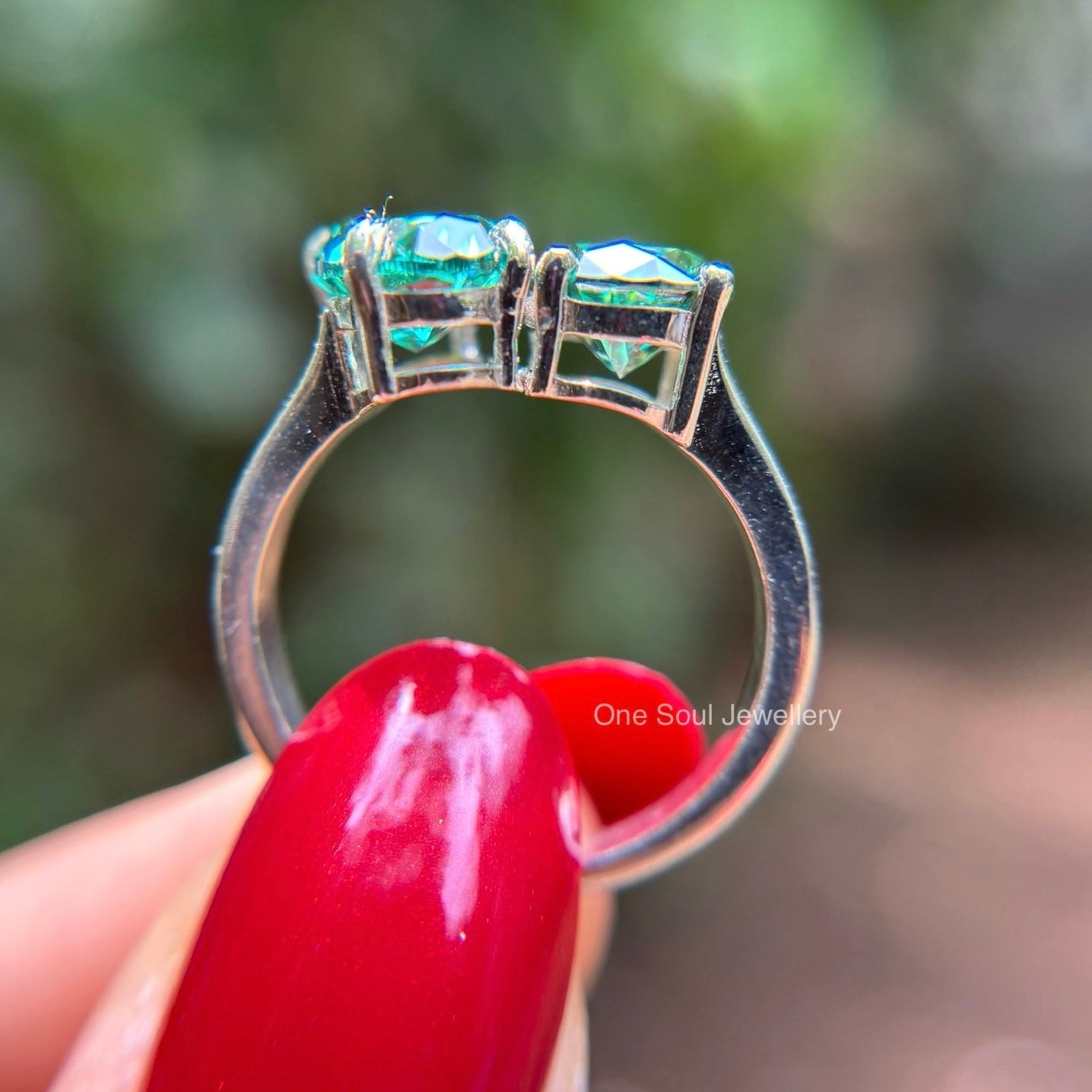 Dark green oval moissanite toi et moi engagement ring in 14K gold