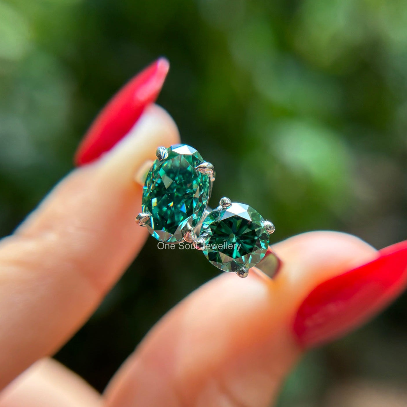 Dark green oval moissanite toi et moi engagement ring in 14K gold