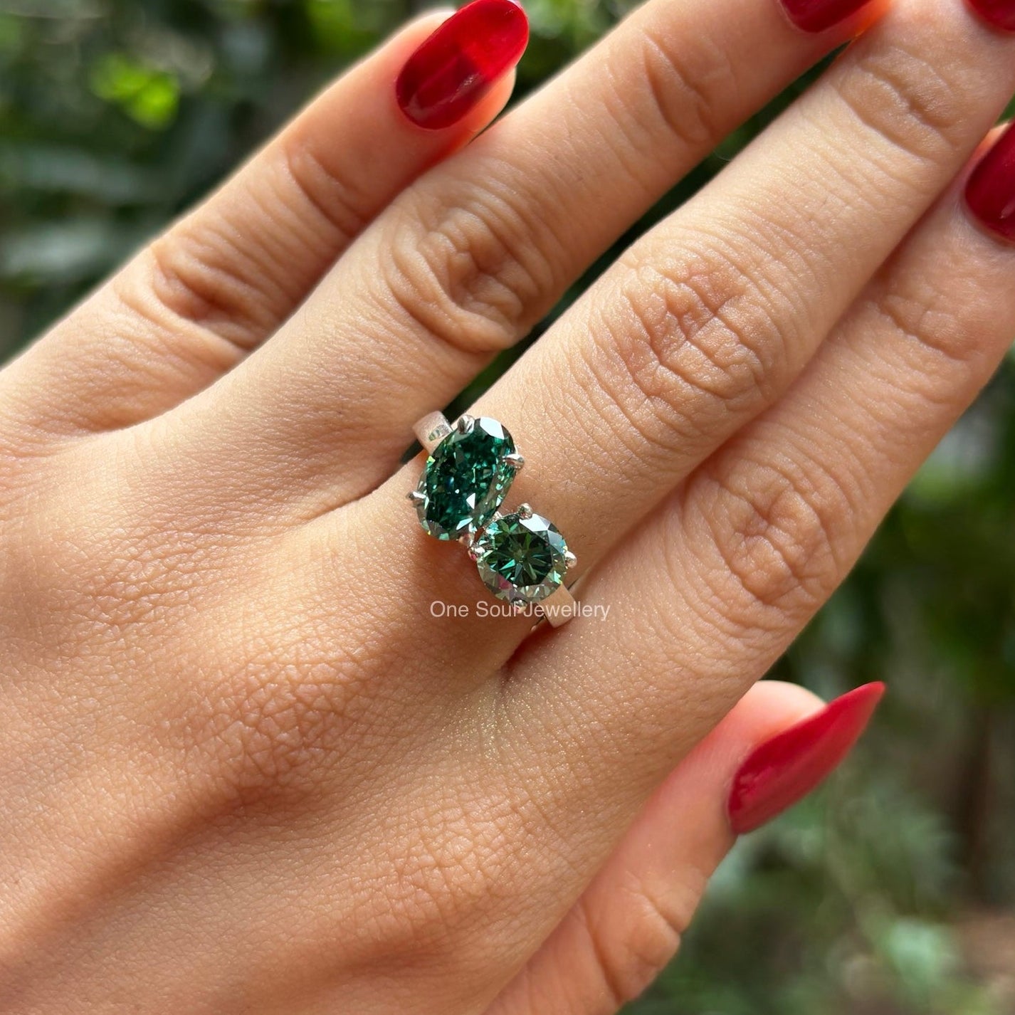 Dark green oval moissanite toi et moi engagement ring in 14K gold