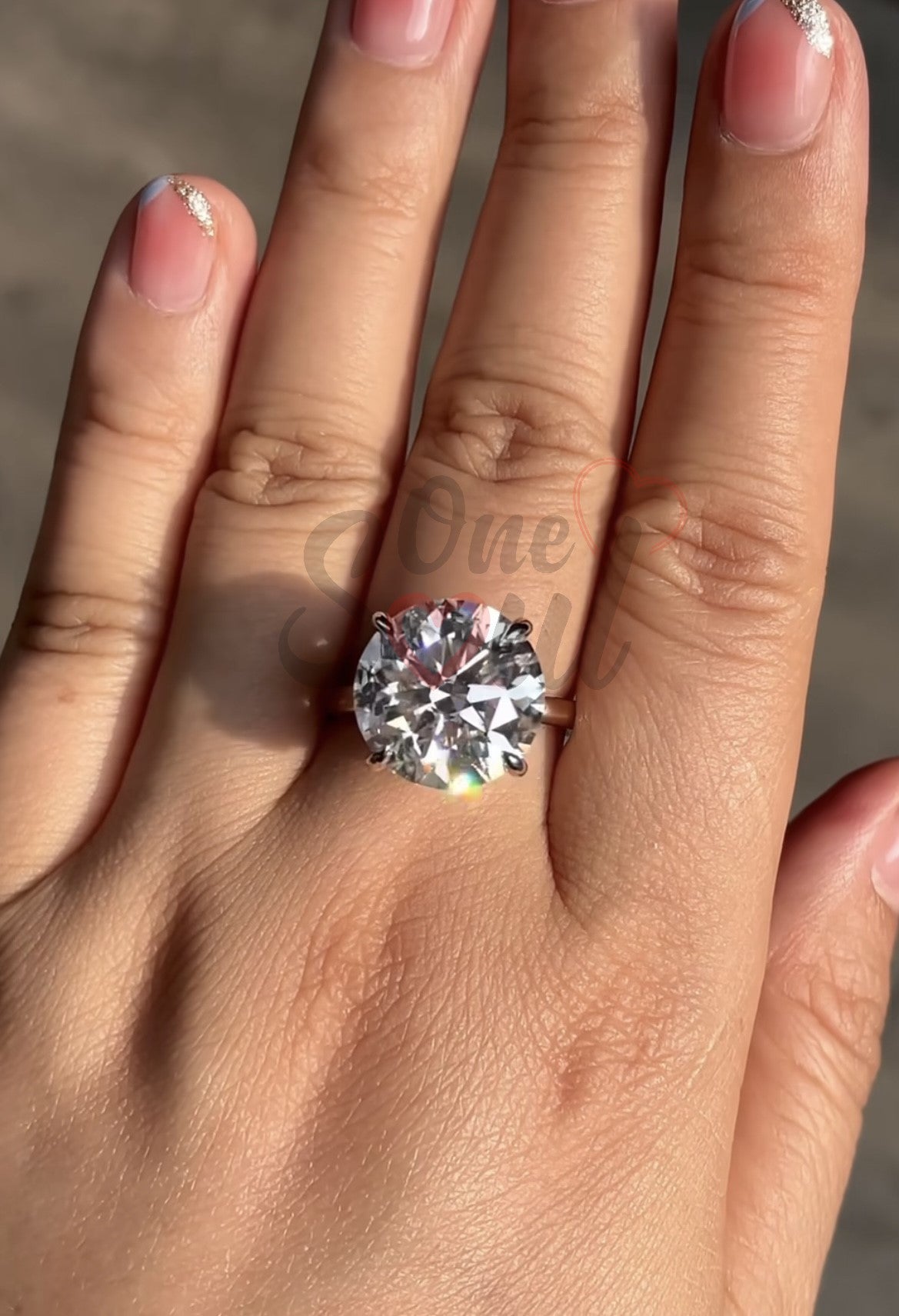 6 carat round brilliant moissanite solitaire engagement ring in 14K white gold with hidden halo and claw prong setting
