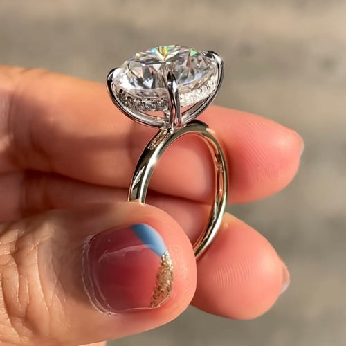 6 carat round brilliant moissanite solitaire engagement ring in 14K white gold with hidden halo and claw prong setting