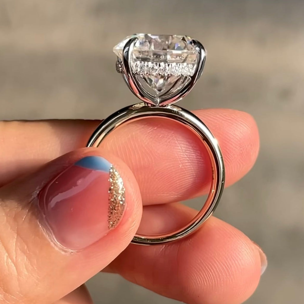 6 carat round brilliant moissanite solitaire engagement ring in 14K white gold with hidden halo and claw prong setting